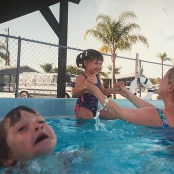 Mother Ignoring Kid Drowning In A Pool