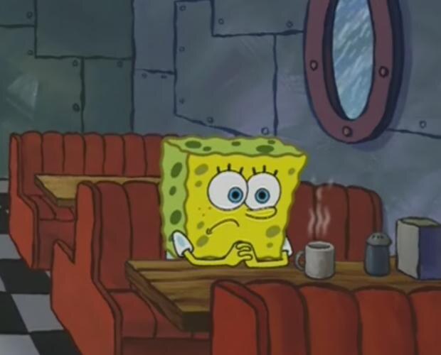 Spongebob sitting alone in diner